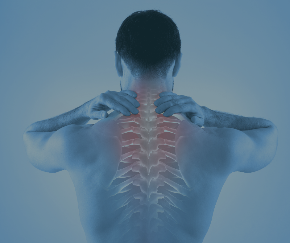 A man is holding his neck in pain.