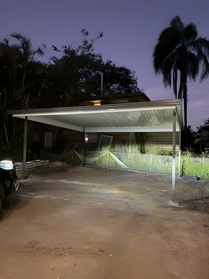 A Car is Parked Under a Carport at Night — JPR Concepts in Burleigh Heads, QLD