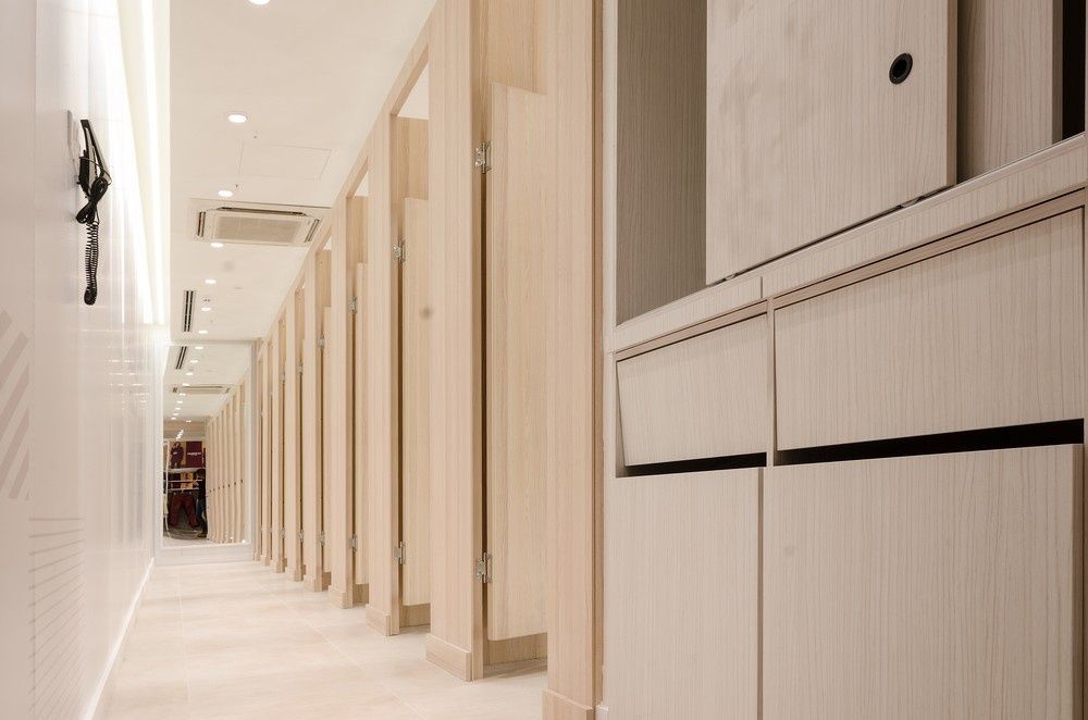 A Long Hallway With a Lot of Doors and Cabinets — JPR Concepts in Burleigh Heads, QLD