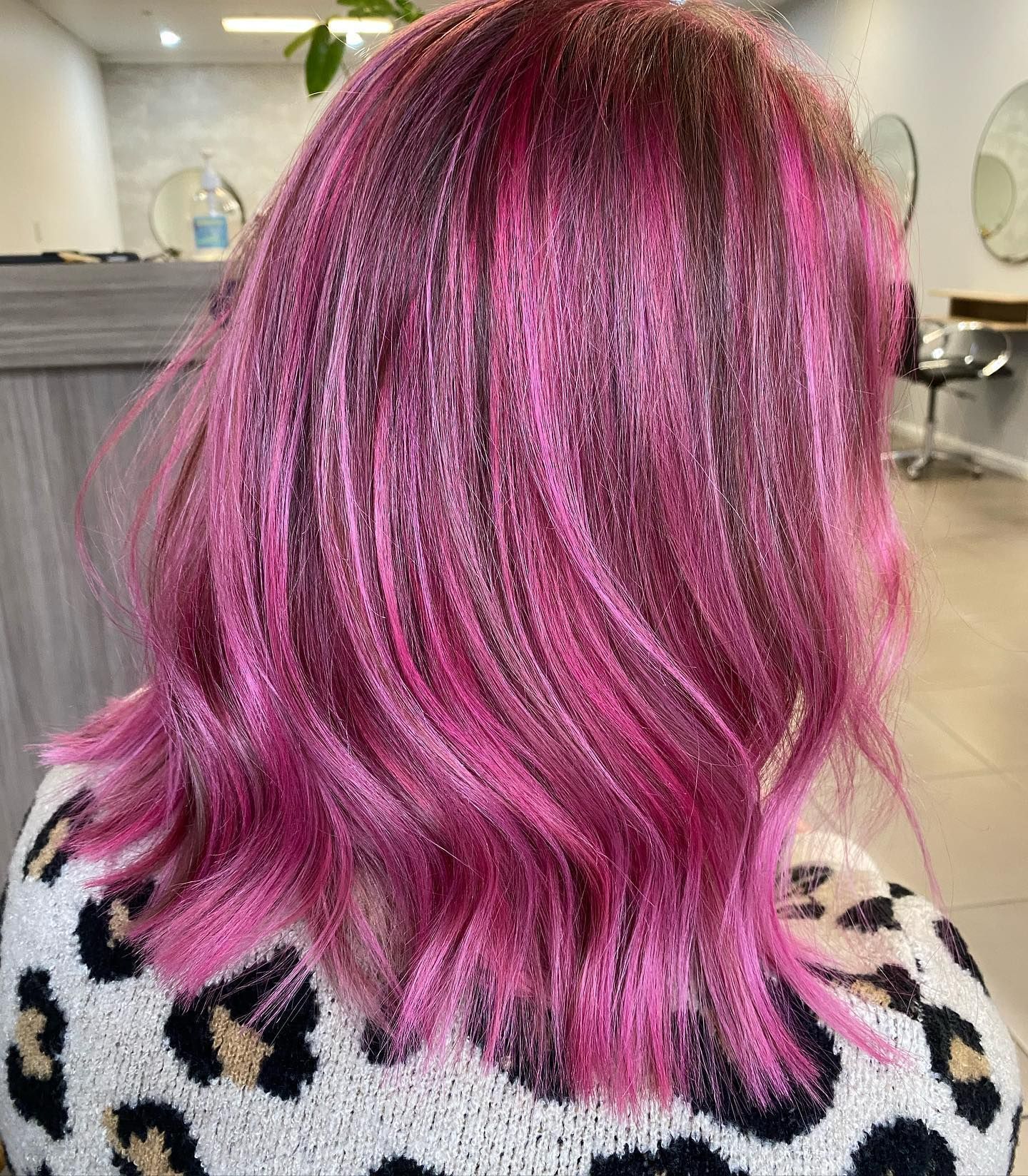 Pink and Black Highlights in Wavy, Shoulder-length Hair — Salon South in Mount Sheridan, QLD