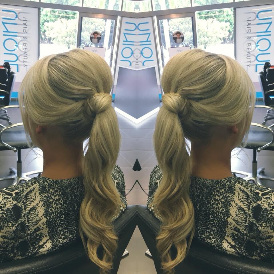 Blonde Hair in a Low Ponytail With a Twisted Detail, Styled in a Salon — That Printed Vinyl Place in Heatley, QLD
