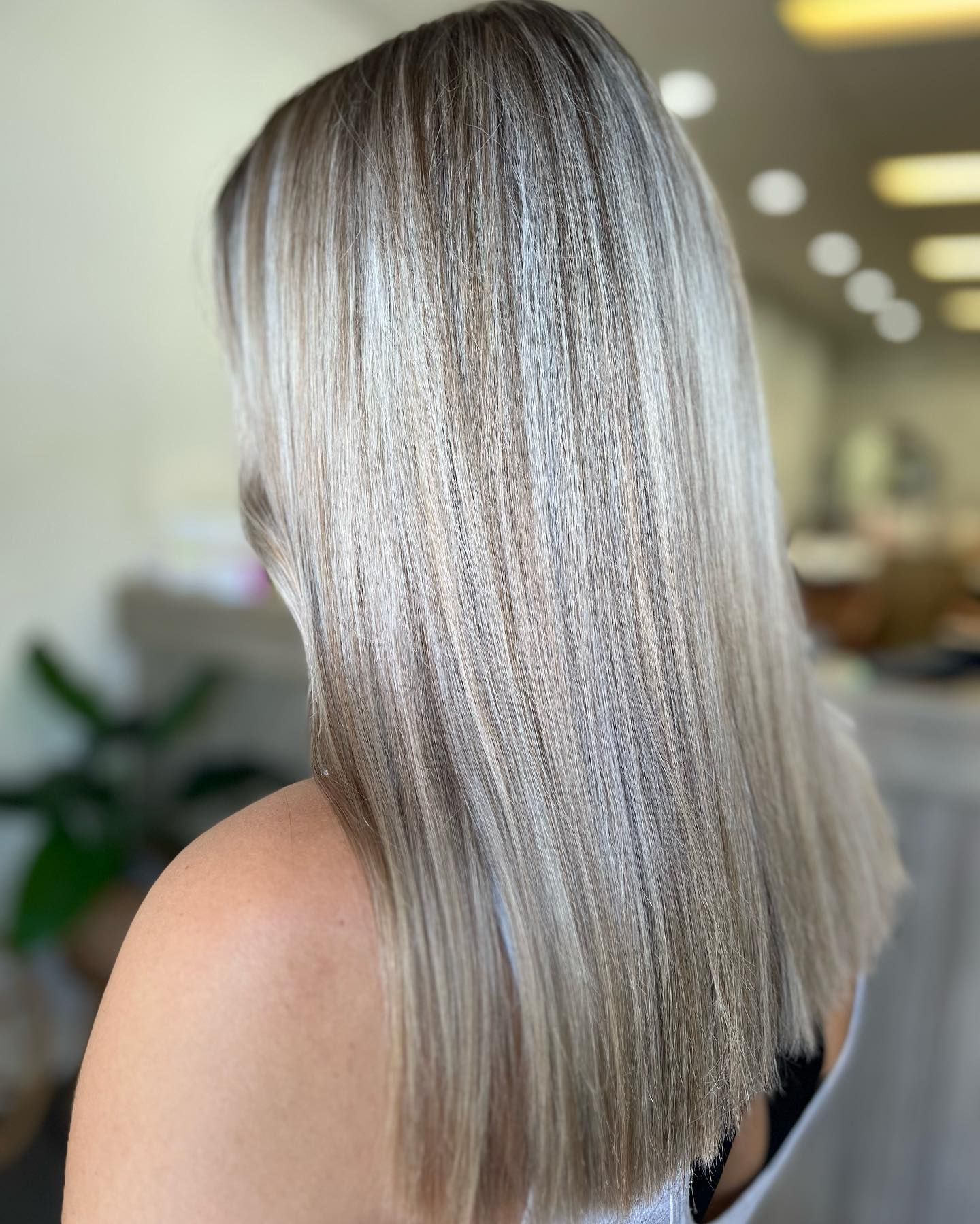 Woman With Blonde Crimped Hair, Salon Setting — Salon South in Mount Sheridan, QLD