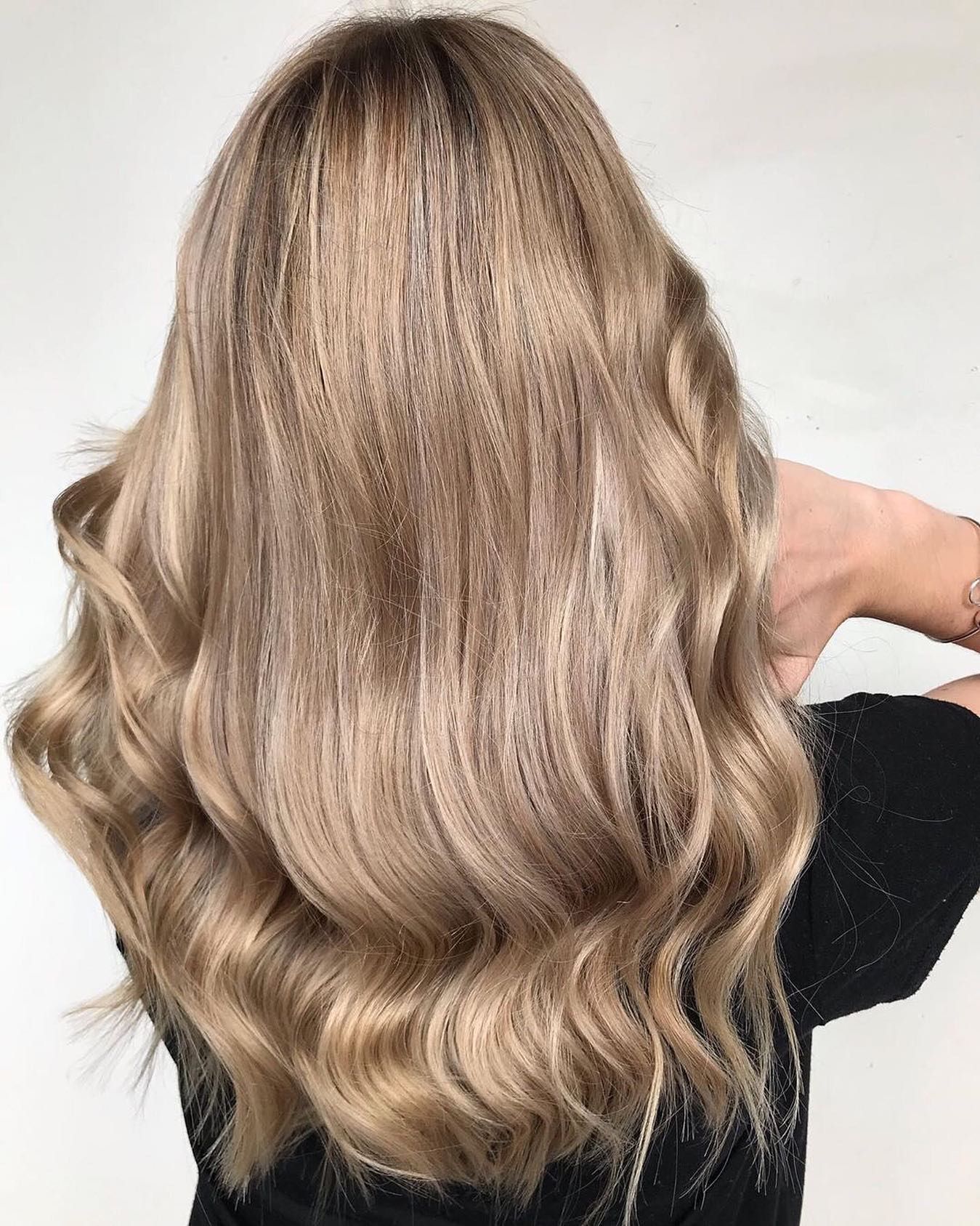 Woman With Long, Wavy, Light Brown Hair — Salon South in Mount Sheridan, QLD