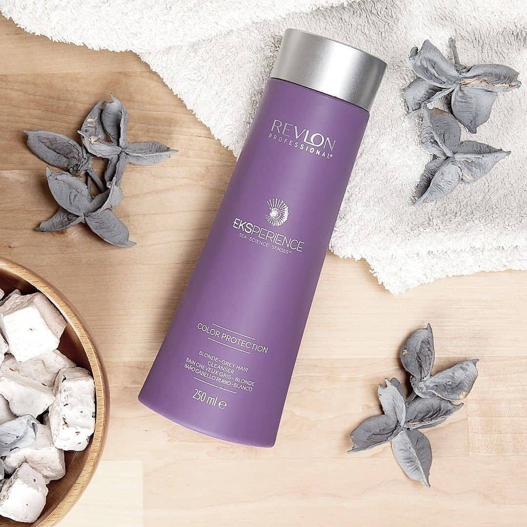 Purple Shampoo Bottle on a White Towel — Salon South in Mount Sheridan, QLD