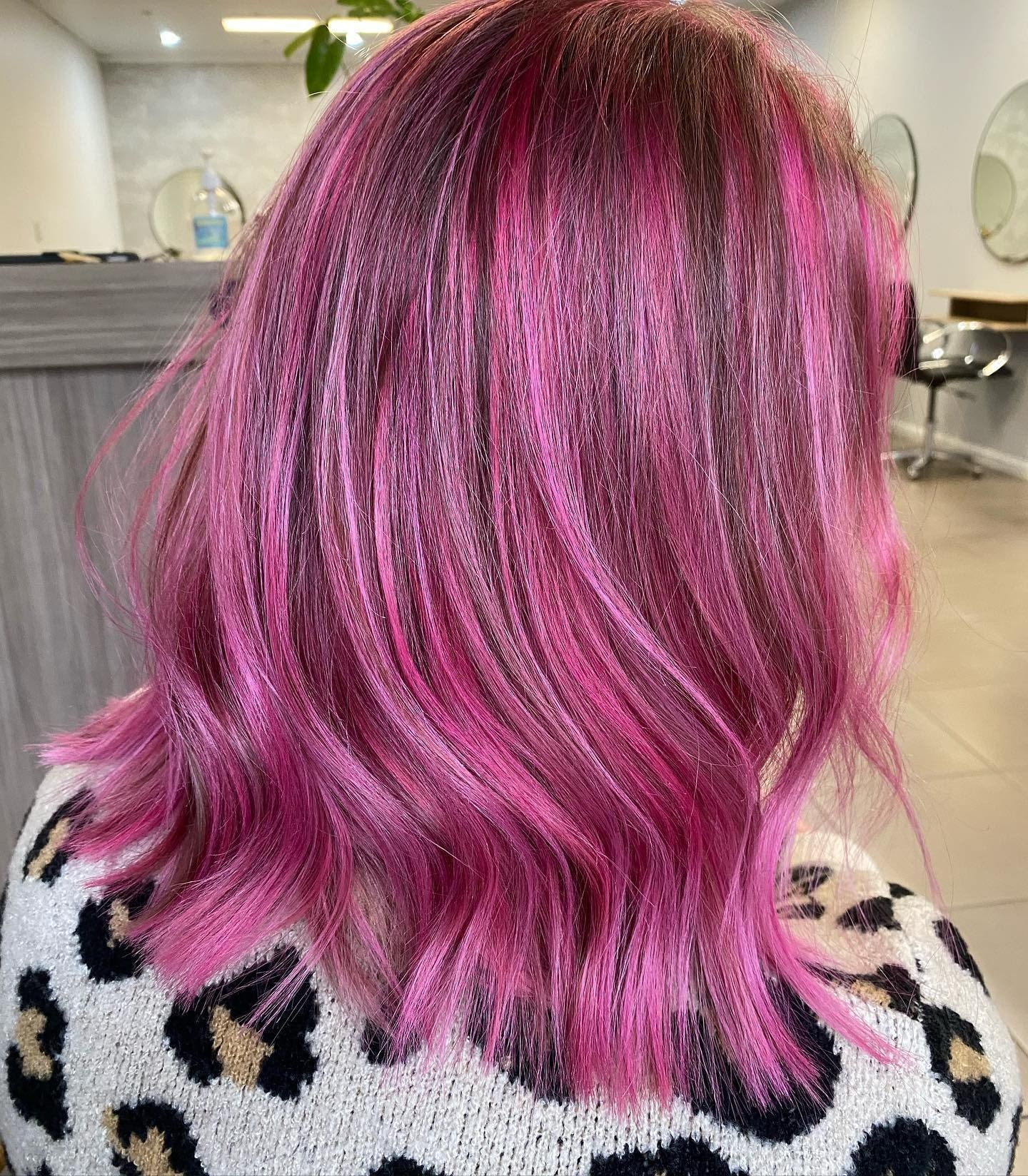 Pink and Dark Magenta-streaked Hair, Shoulder-length, Styled With Waves — Salon South in Mount Sheridan, QLD