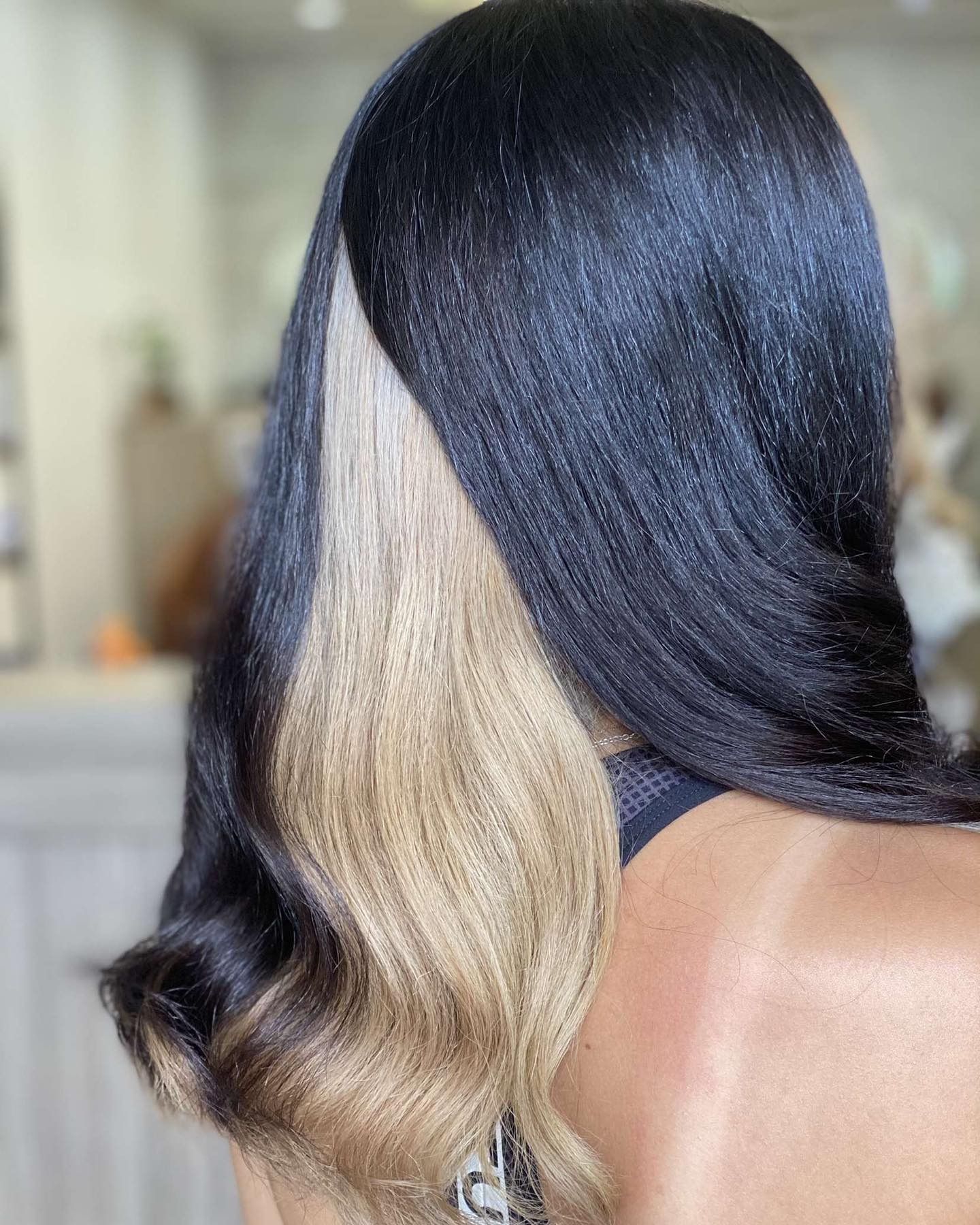 Black Hair With a Blonde Side, Styled in Smooth Waves — Salon South in Mount Sheridan, QLD