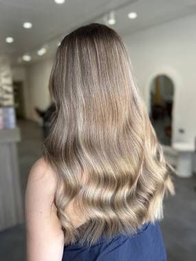 Blonde-haired Person With A Layered Bob Haircut Indoors, Looking To The Side — That Printed Vinyl Place in Heatley, QLD