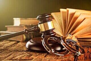 Gavel And Handcuff — Fredericksburg, VA — The Law Office of Michael J. George