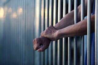 Arms On The Prison Bars — Fredericksburg, VA — The Law Office of Michael J. George