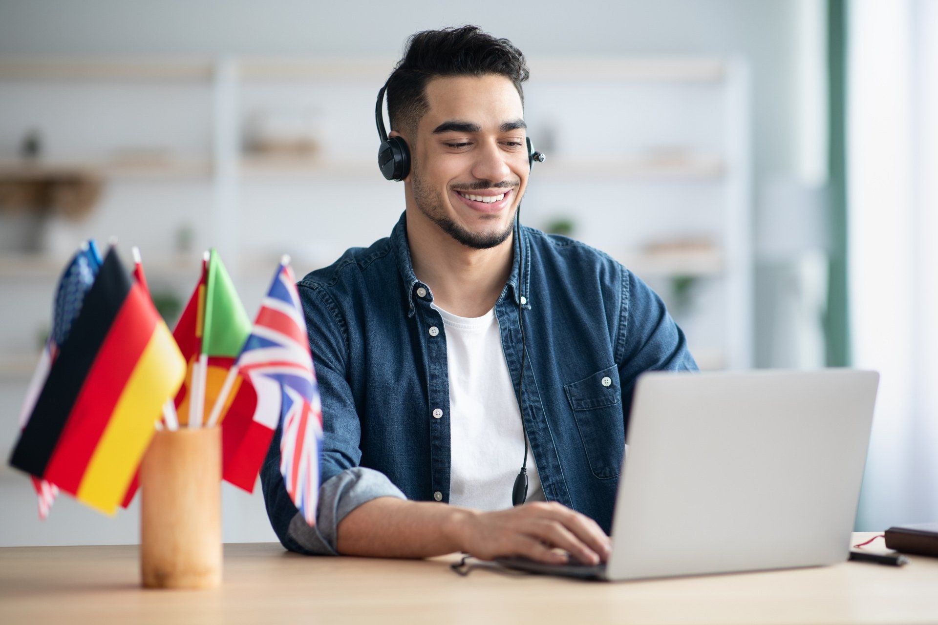 Man listening to a language learning program