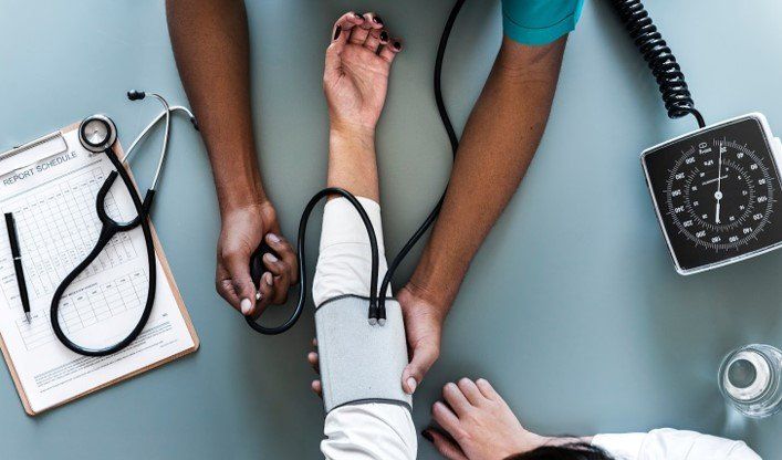 Checking blood pressure — Nashville, TN — Nashville Healthcare Center