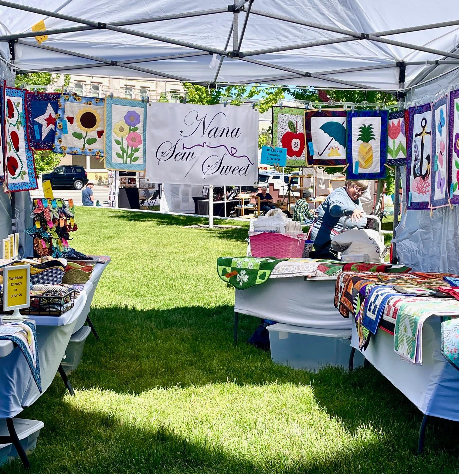 A tent with a sign that says nana sews sweet