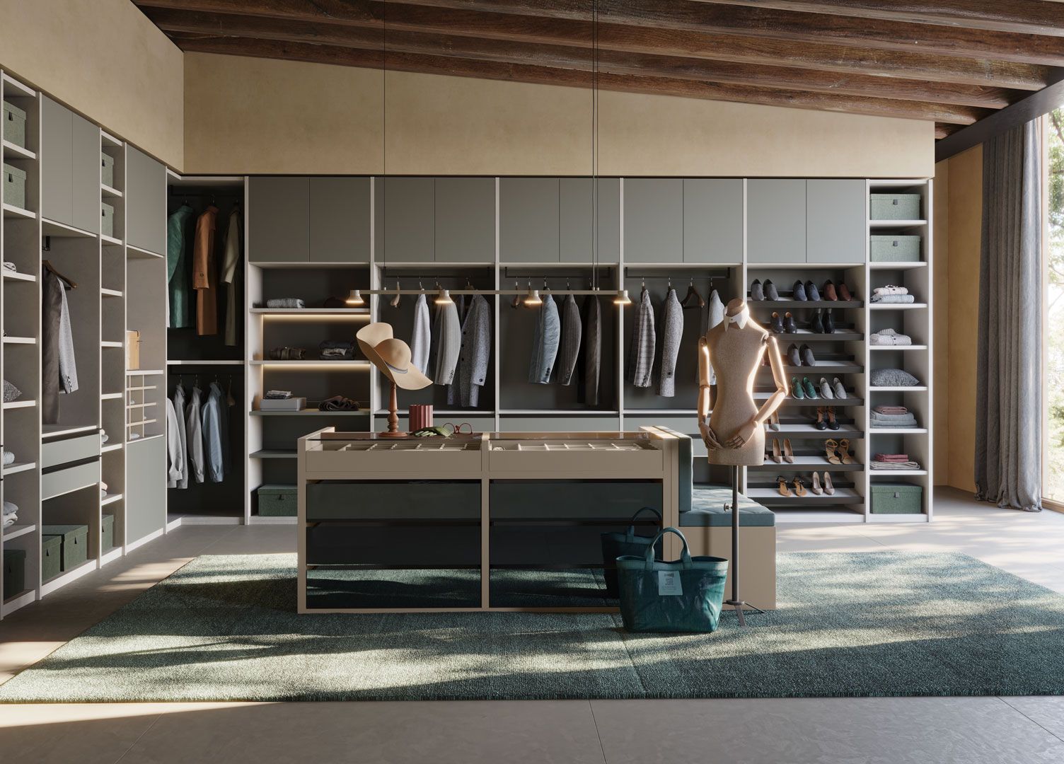 Cabina armadio con mobili grigi, isola centrale e ampia finestra. Vestiti e scarpe sono ben organizzati.