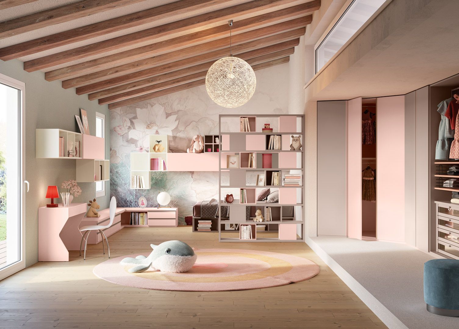 Cameretta per bambini sui toni del rosa, con scrivania, scaffali, cabina armadio e un grande tappeto con balene.