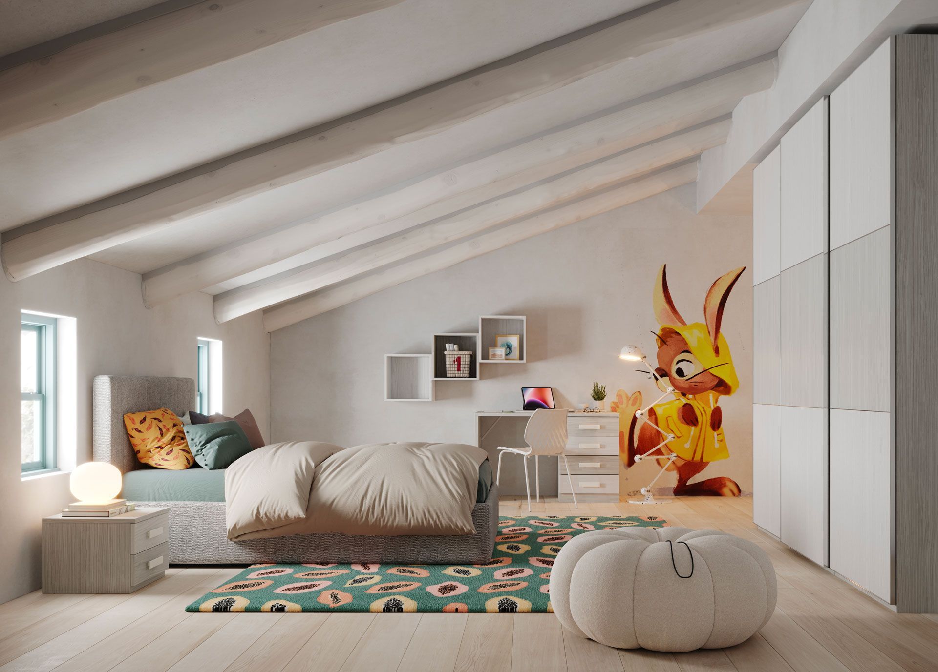 Una cameretta per bambini con soffitto spiovente, letto, scrivania e decorazione a forma di coniglietto dei cartoni animati.