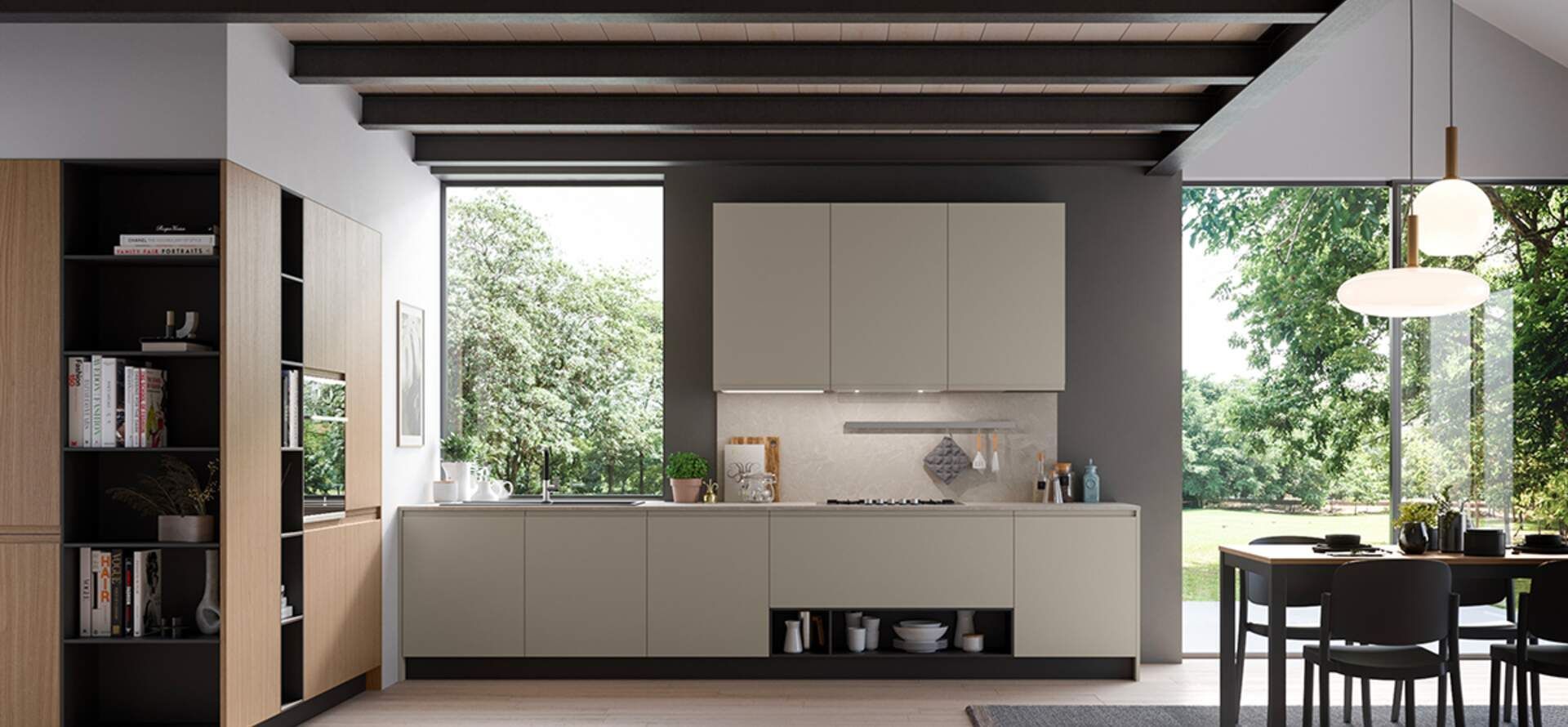 Cucina moderna con mobili beige chiaro, ampie finestre e zona pranzo.