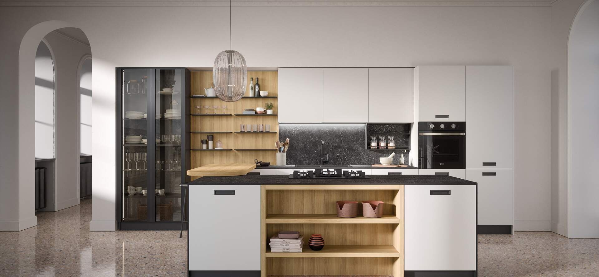 Cucina moderna con mobili bianchi, ripiani neri e dettagli in legno.