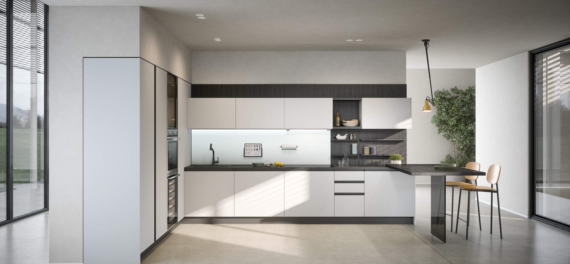 Cucina moderna con mobili bianchi, ripiani scuri e un'isola con posti a sedere.