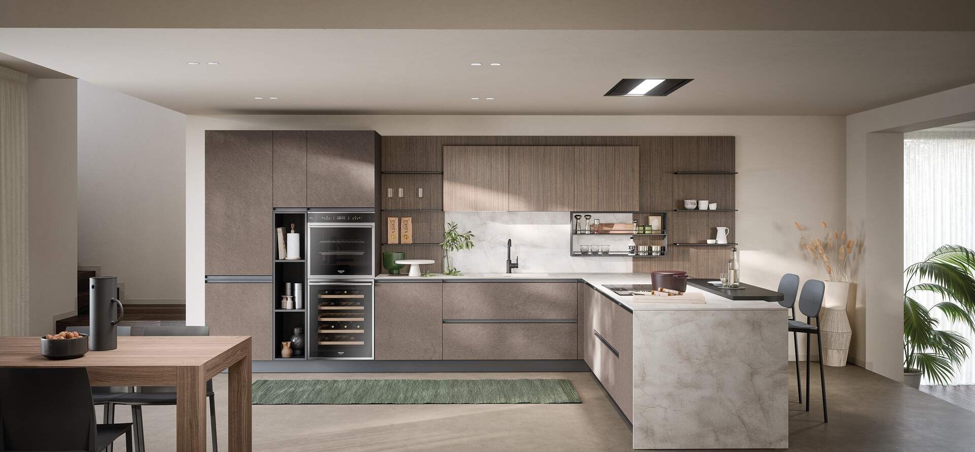 Cucina moderna con mobili marroni, isola e zona pranzo.