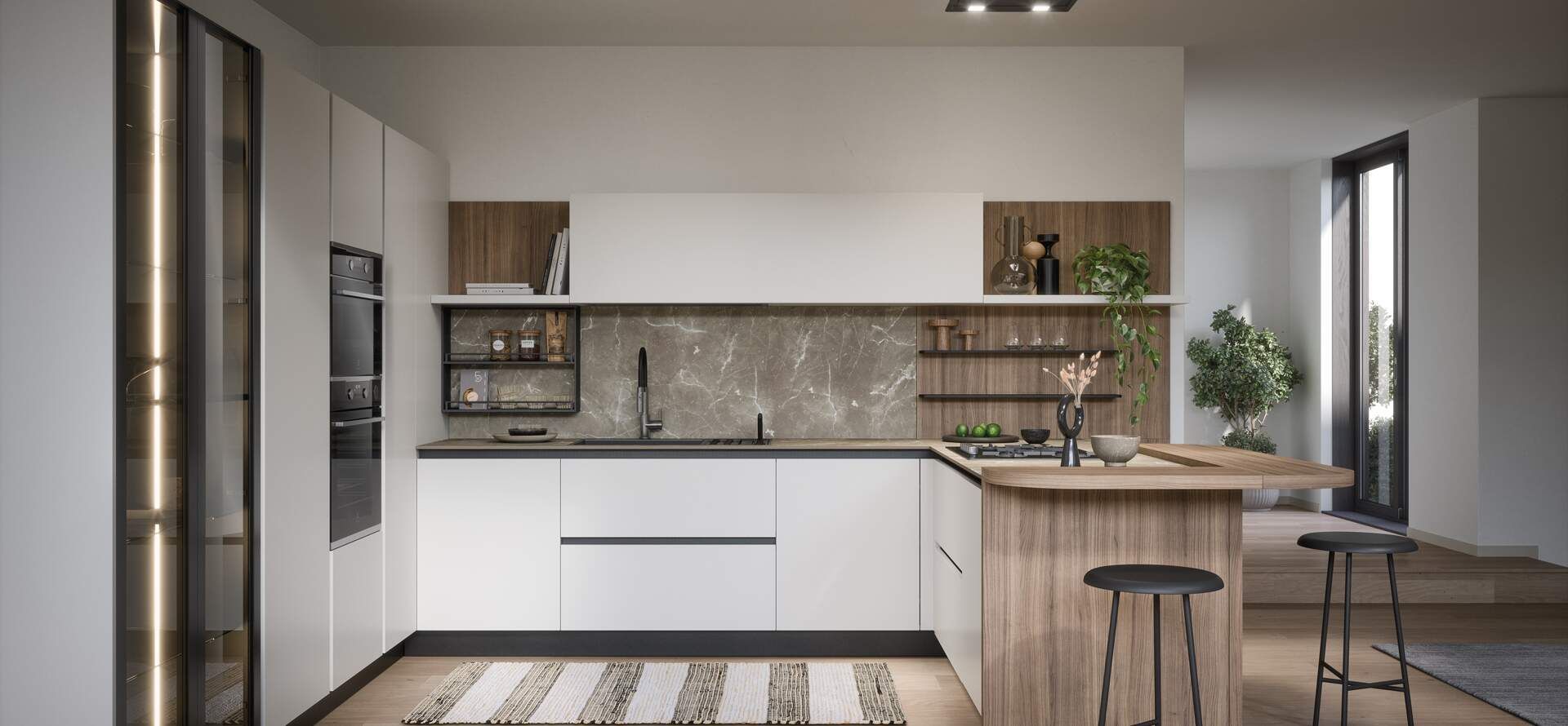 Cucina moderna con mobili bianchi, isola in legno e paraschizzi in pietra grigia.