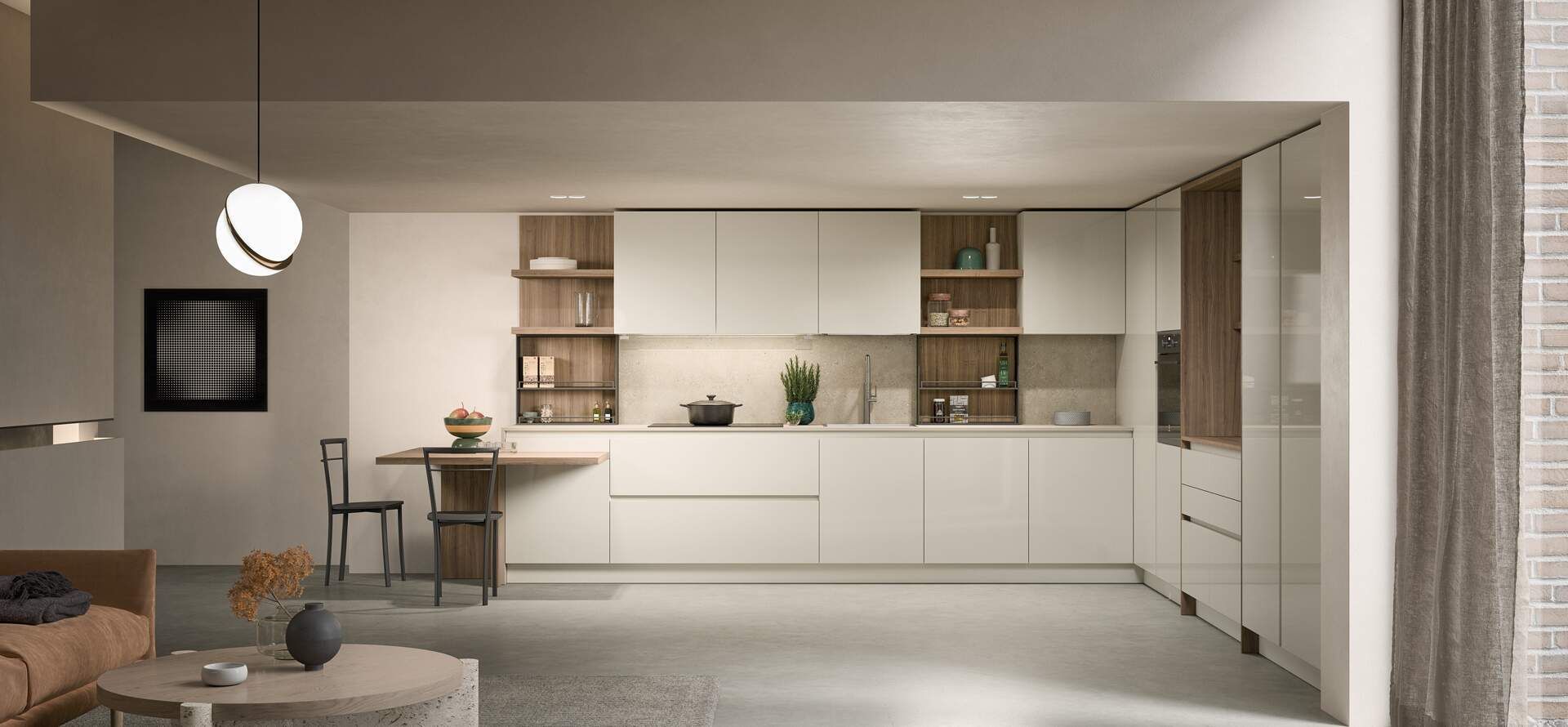 Cucina moderna con mobili bianchi, dettagli in legno e un piccolo tavolo da pranzo.