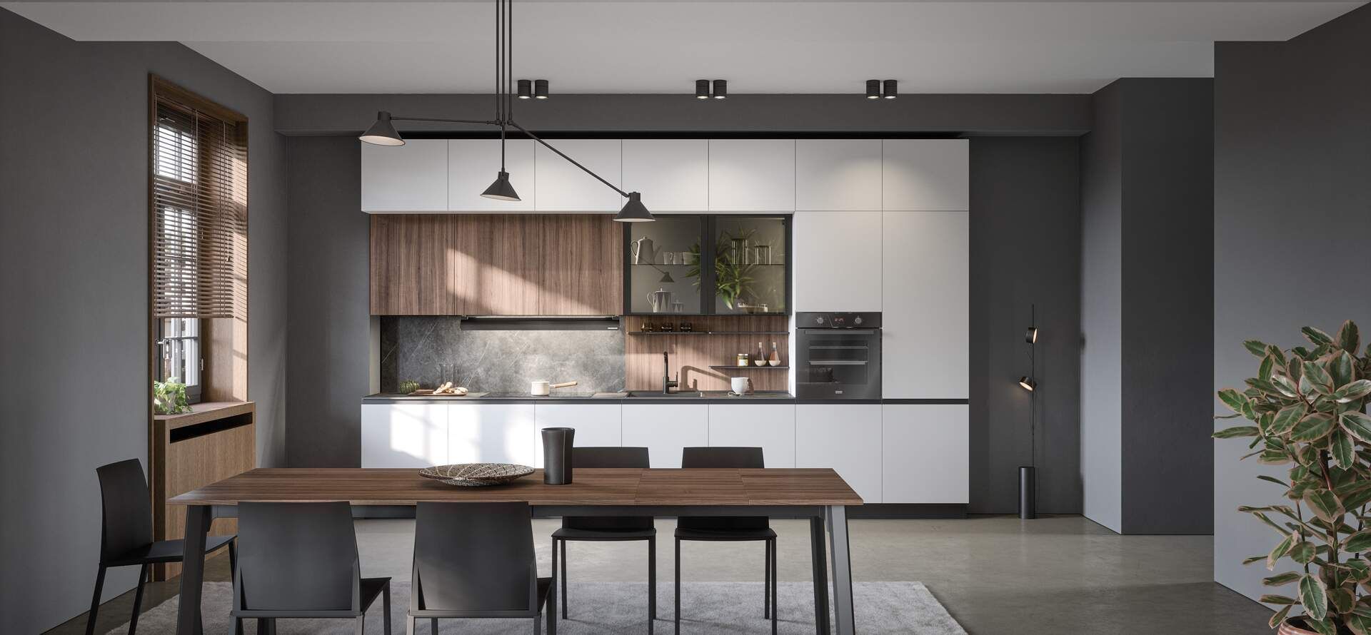 Cucina e sala da pranzo moderne con tavolo in legno, sedie scure e mobili bianchi e in legno.