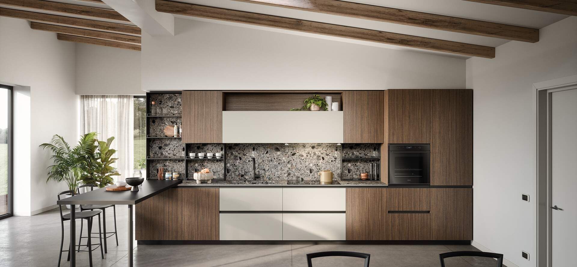 Cucina moderna con mobili in legno, ripiani bianchi e zona pranzo con tavolo nero.