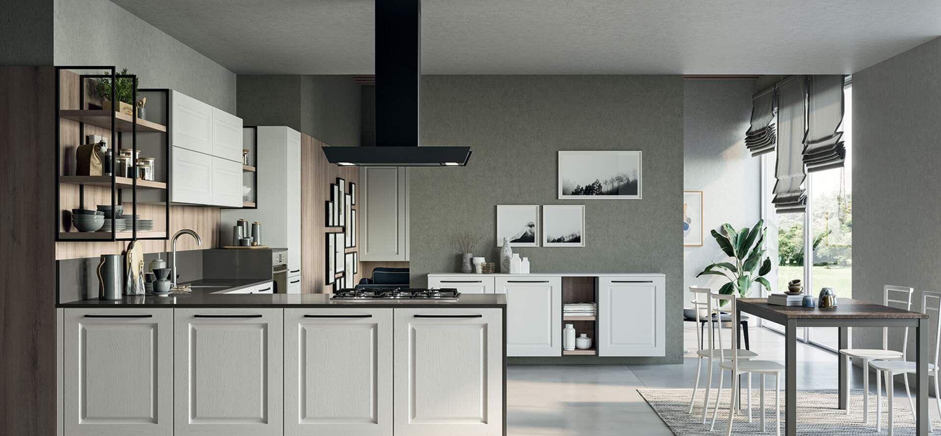 Cucina moderna con mobili grigi, isola e zona pranzo con ampia finestra.