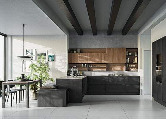 Cucina moderna con mobili in legno scuro, pensili in legno chiaro e tavolo da pranzo.