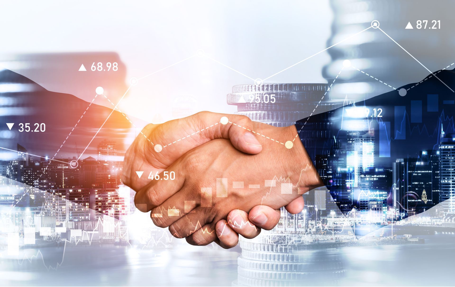 Two businessmen are shaking hands in front of a city skyline.