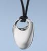 A smooth, silver-toned, organic-shaped pendant hanging from a black cord against a light blue background.