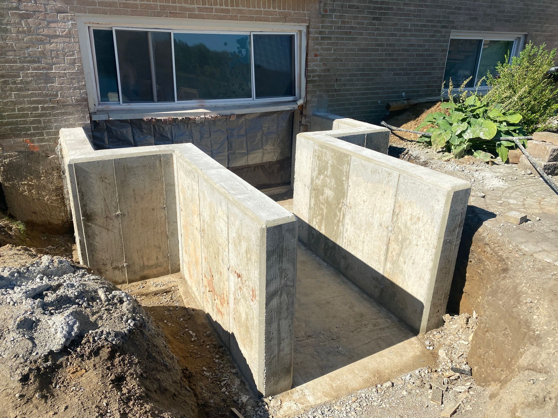 Concrete Retaining Wall egress exit