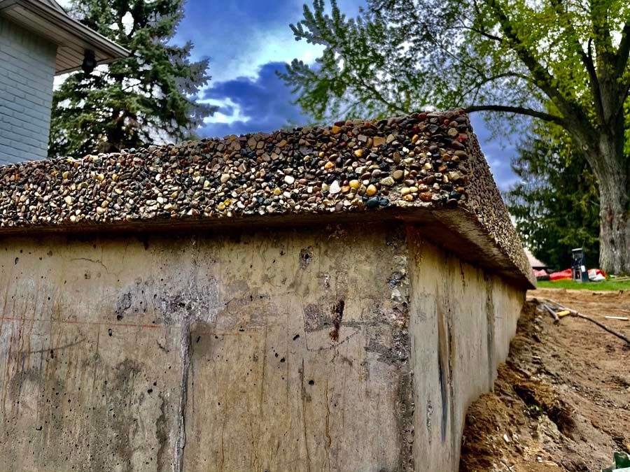 Cantilevered, concrete edge