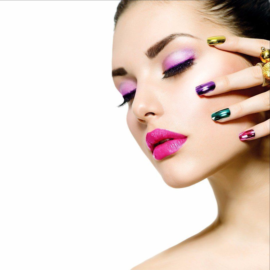 model with pink makeup and multicoloured nails
