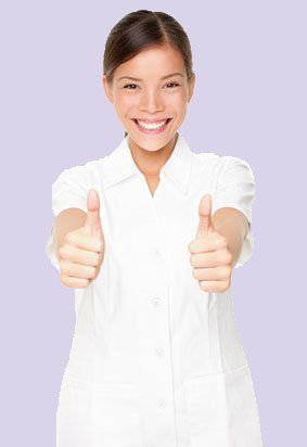 practitioner with her thumbs up