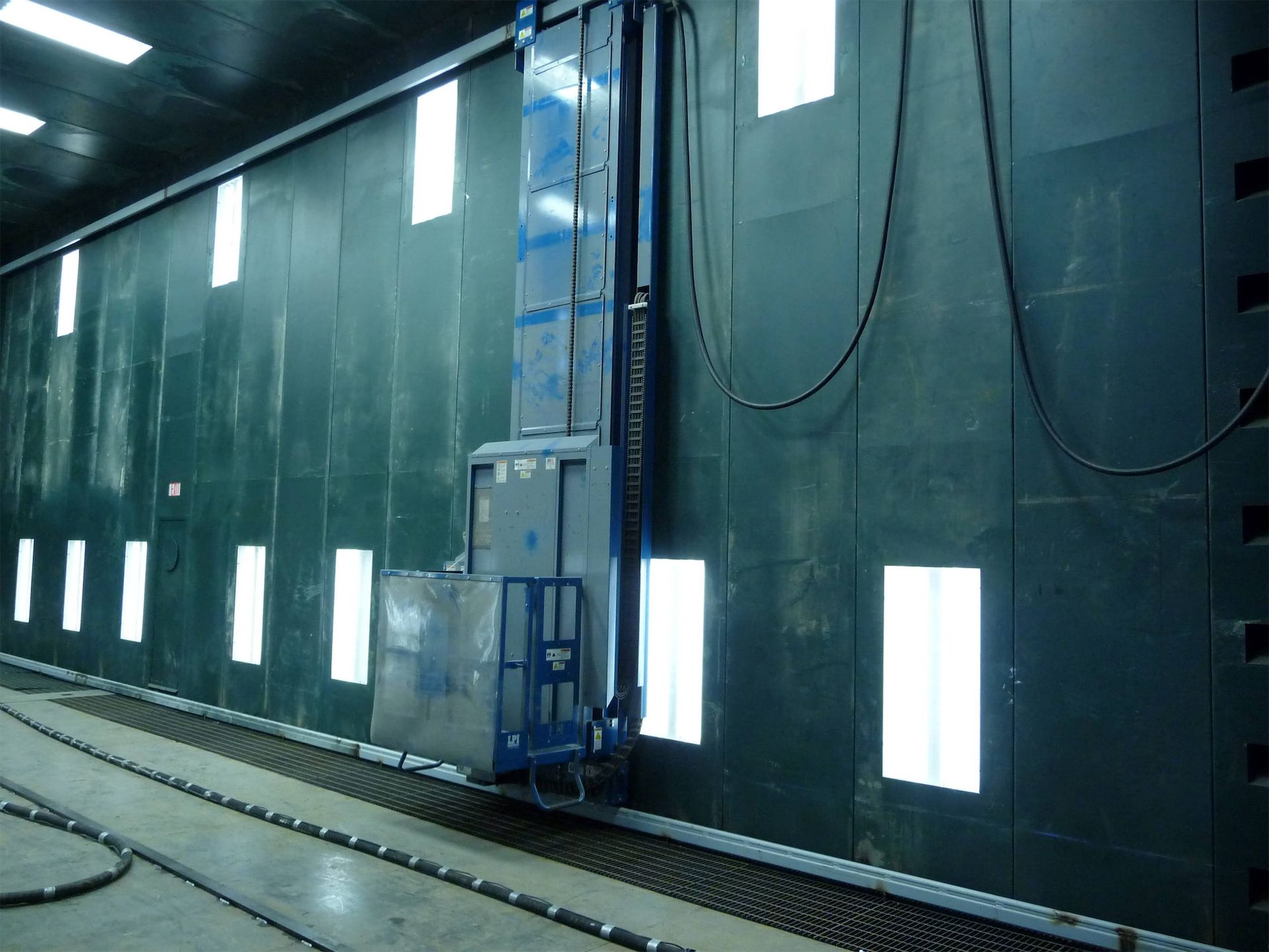 LPI man lift one on each side wall