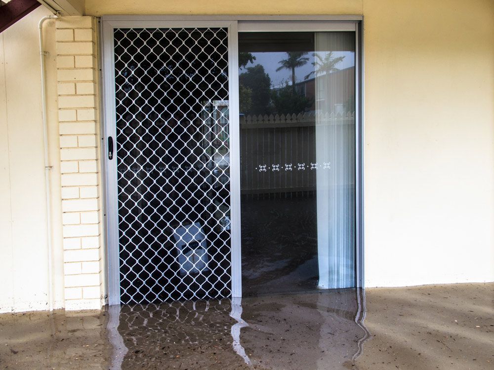 Flood Waters Through Screen Door — Shunter Enterprises in Christchurch, QLD