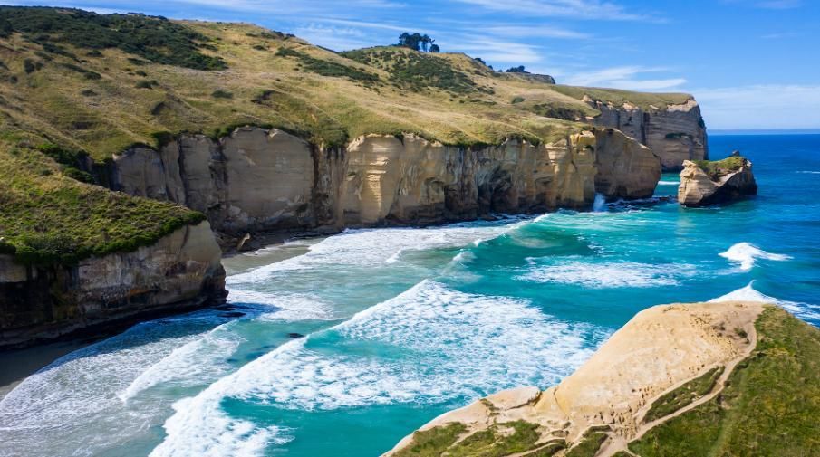 Famous Tunnel Beach — As Is Where Is in Dunedin, NZ