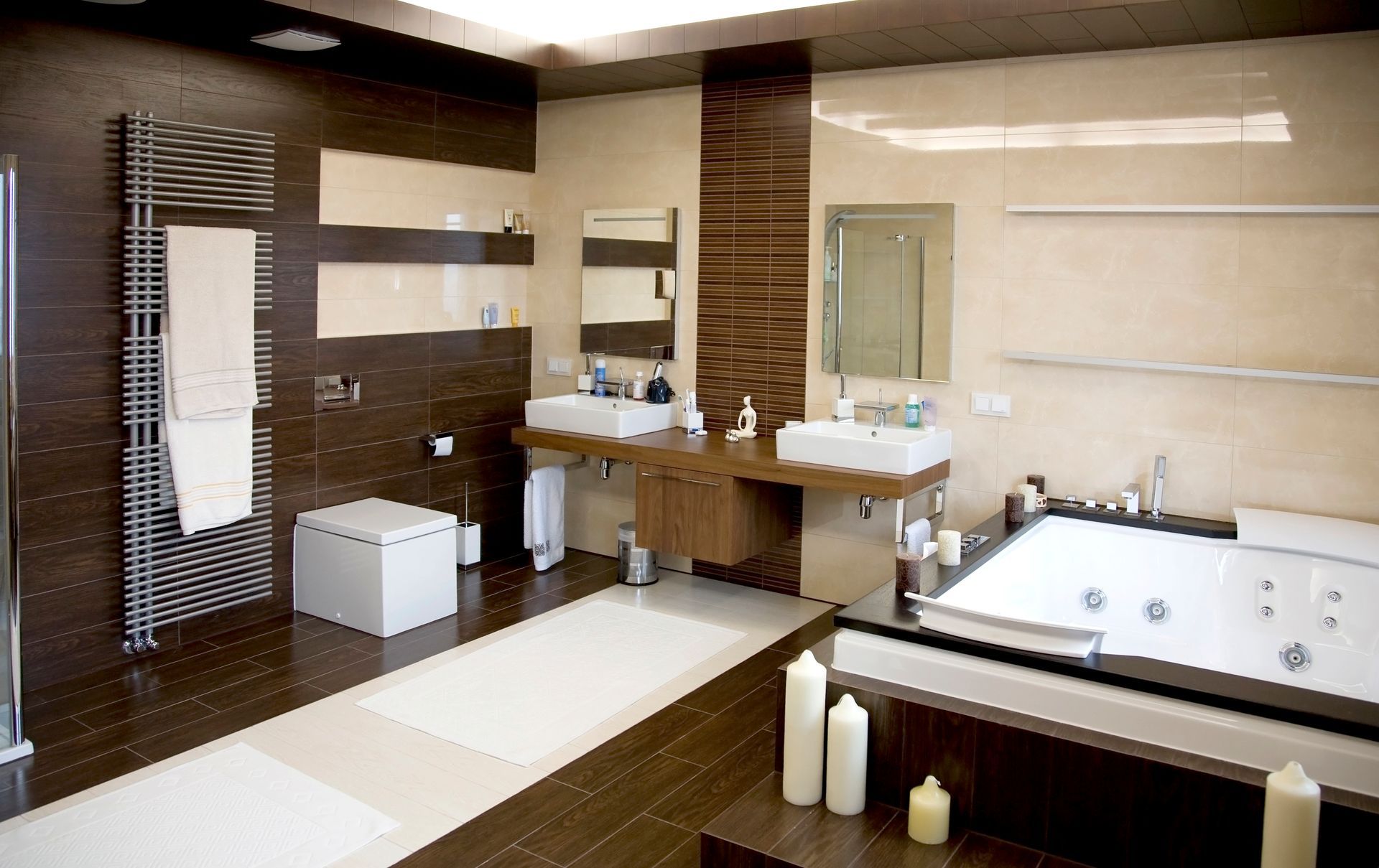 Modern bathroom with a stylish bathtub, updated vanity, and fresh tile after bathroom remodeling.