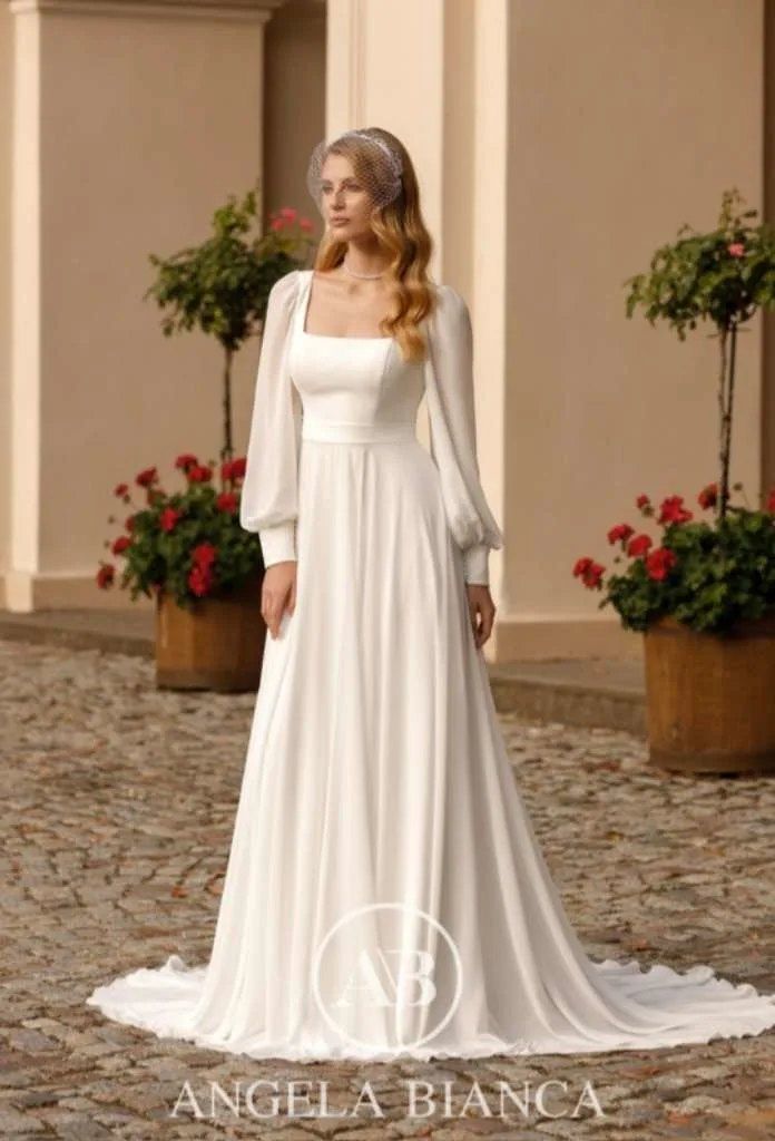 Two wedding dress designs from Angela Bianca collection