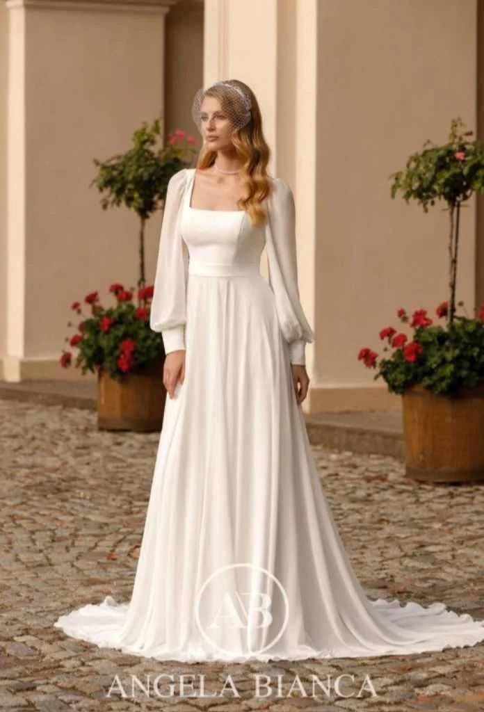 Two wedding dress designs from Angela Bianca collection