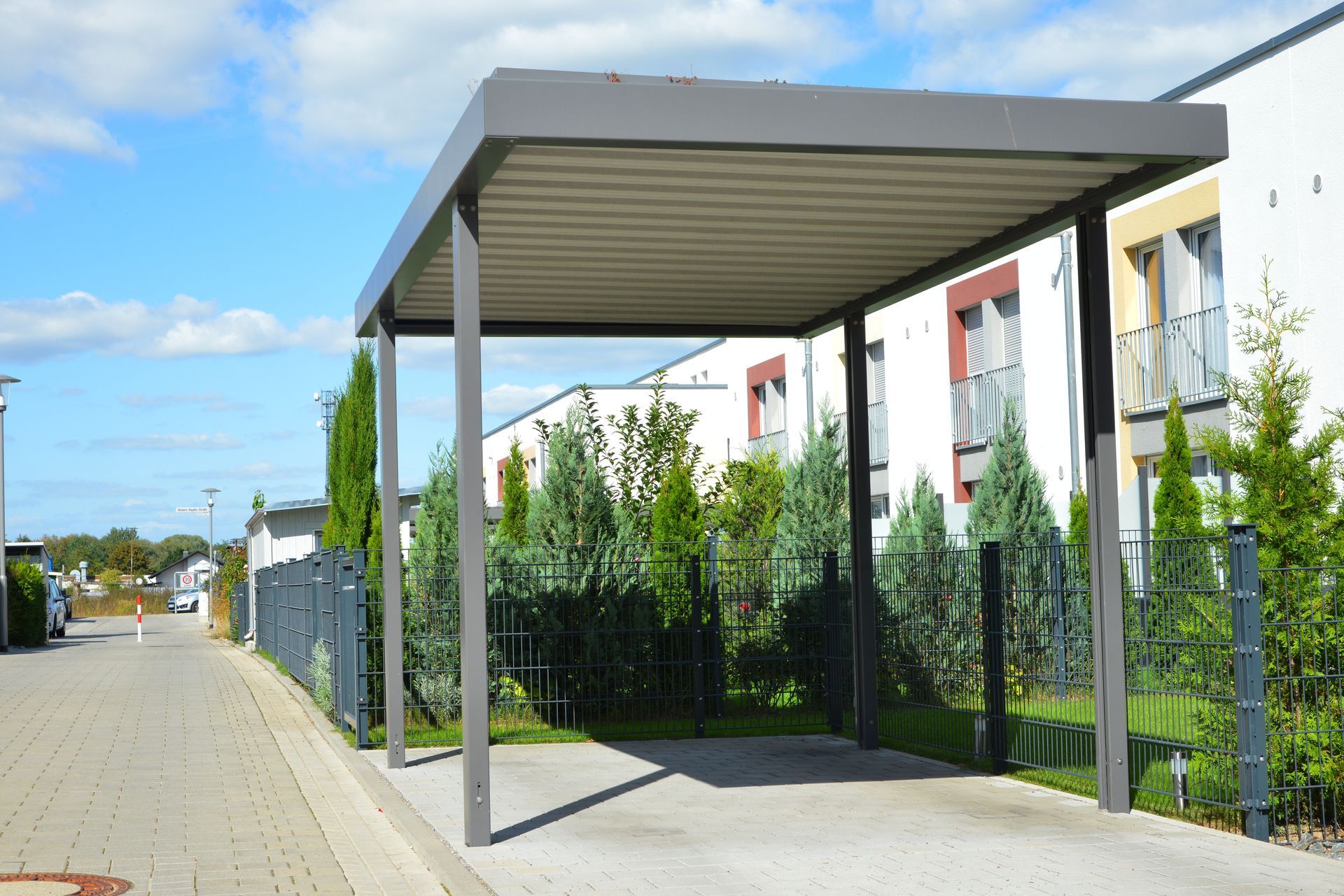 Carport With a Gray Roof and Supports Over a Driveway — Dachboe Your Handyman In Ayr, QLD