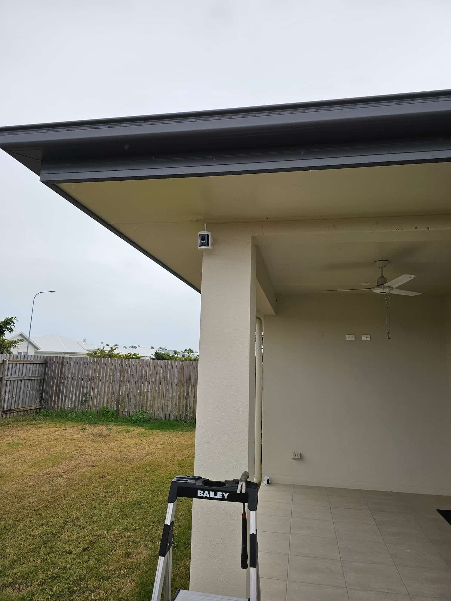 A Walker Is Sitting On The Side Of A House — Dachboe Your Handyman in Townsville, QLD