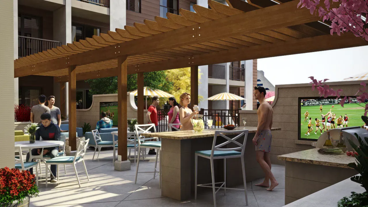 Outdoor communal lounge under a wooden pergola with bar seating and residents socializing.