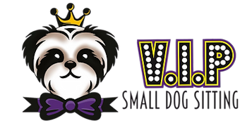 A small dog with a crown on its head and a bow tie.