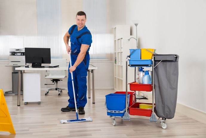 Commercial Cleaning — Man Cleaning the Floor in Will County