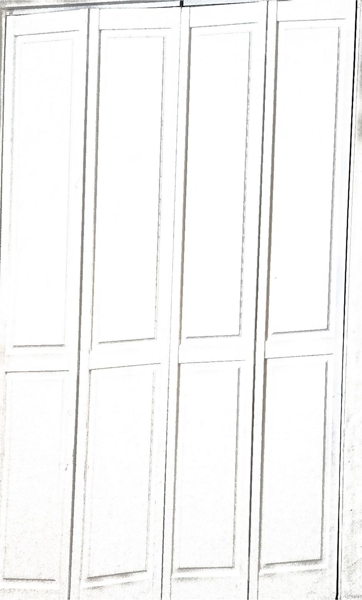 White folding door, rectangular panels, vertical arrangement.