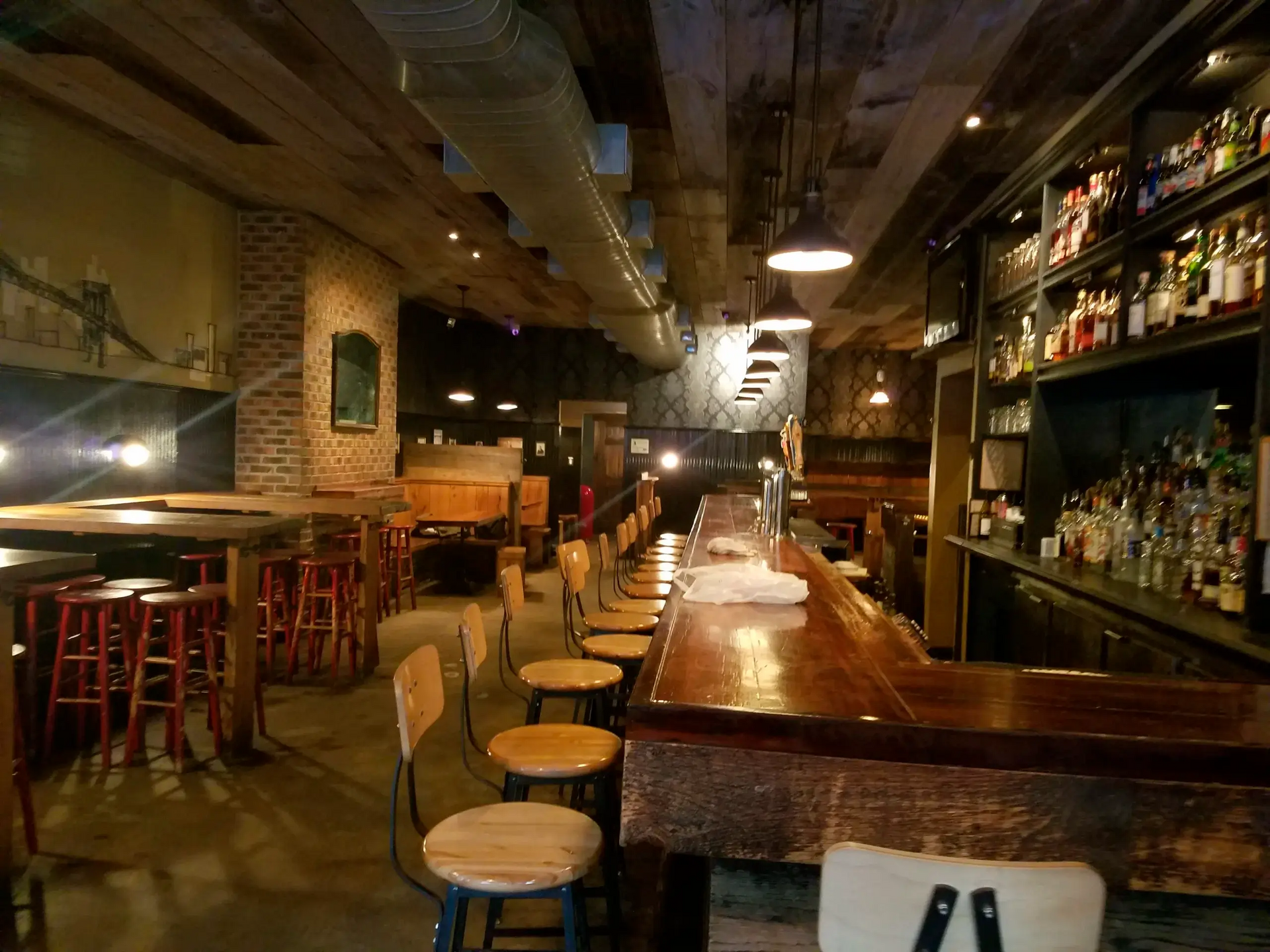 A bar with a sign that says ' a ' on it