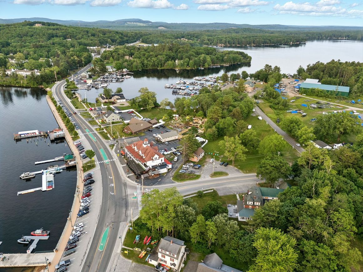 A sunset over a mountain range with a lot of fog