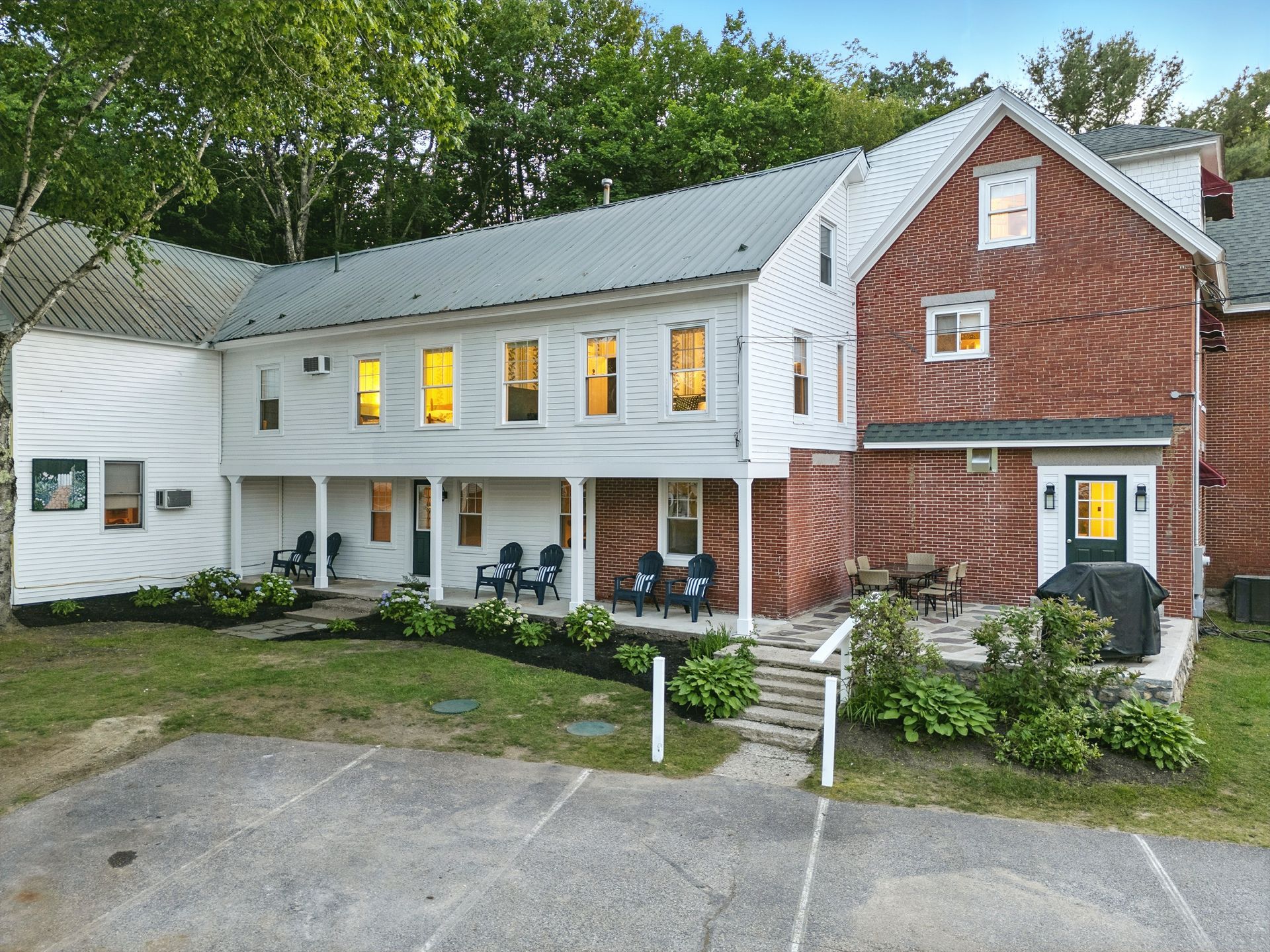 A sunset over a mountain range with a lot of fog